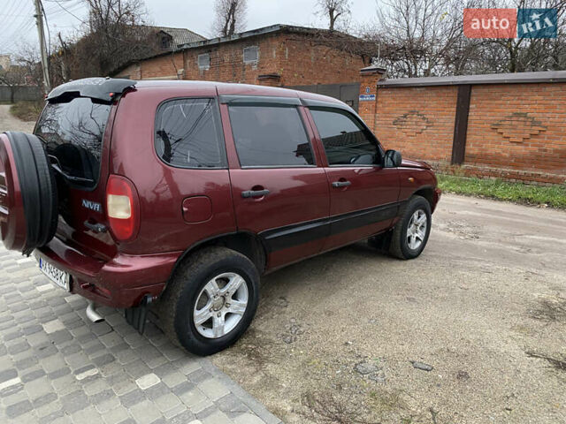 Червоний Шевроле Нива, об'ємом двигуна 1.69 л та пробігом 200 тис. км за 4450 $, фото 10 на Automoto.ua