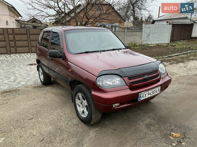 Червоний Шевроле Нива, об'ємом двигуна 1.69 л та пробігом 200 тис. км за 4450 $, фото 7 на Automoto.ua