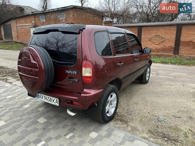 Червоний Шевроле Нива, об'ємом двигуна 1.69 л та пробігом 200 тис. км за 4450 $, фото 11 на Automoto.ua