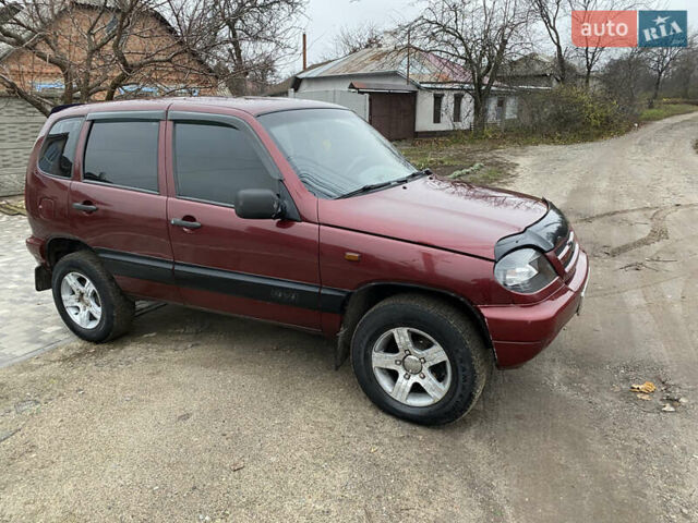 Червоний Шевроле Нива, об'ємом двигуна 1.69 л та пробігом 200 тис. км за 4450 $, фото 8 на Automoto.ua