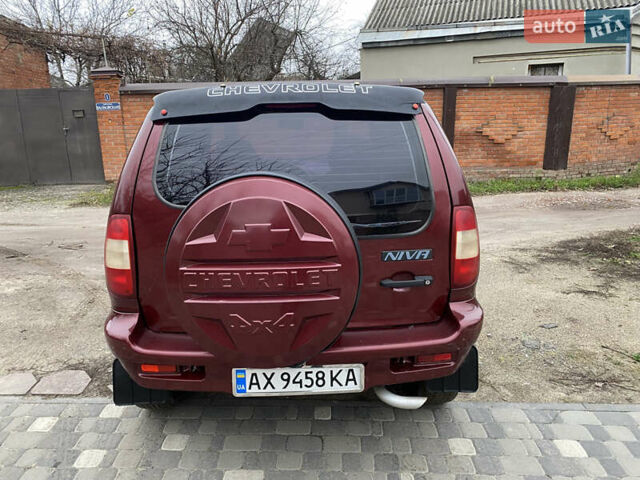 Червоний Шевроле Нива, об'ємом двигуна 1.69 л та пробігом 200 тис. км за 4450 $, фото 5 на Automoto.ua