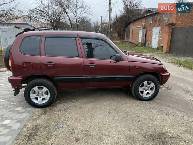 Червоний Шевроле Нива, об'ємом двигуна 1.69 л та пробігом 200 тис. км за 4450 $, фото 9 на Automoto.ua