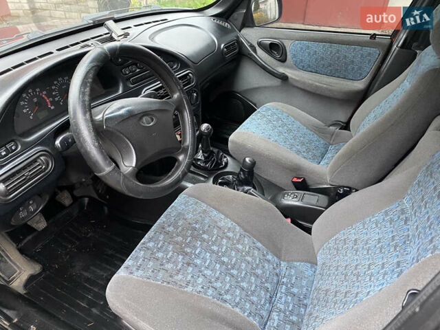 Червоний Шевроле Нива, об'ємом двигуна 1.69 л та пробігом 200 тис. км за 4450 $, фото 14 на Automoto.ua