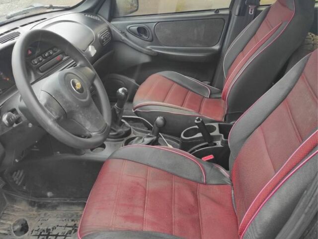 Шевроле Нива 2016 в Ладыжин на Automoto.ua Красный Шевроле Нива, объемом двигателя 1.7 л и пробегом 131 тыс. км за 6130 $, фото 6 на Automoto.ua