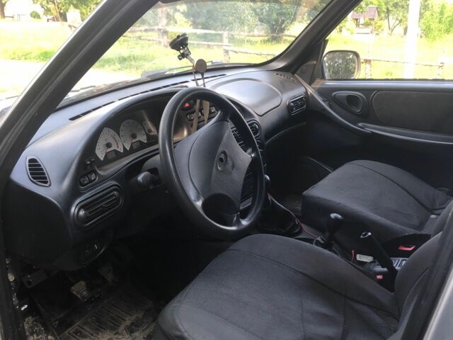 Серый Шевроле Нива, объемом двигателя 1.9 л и пробегом 54 тыс. км за 3000 $, фото 8 на Automoto.ua