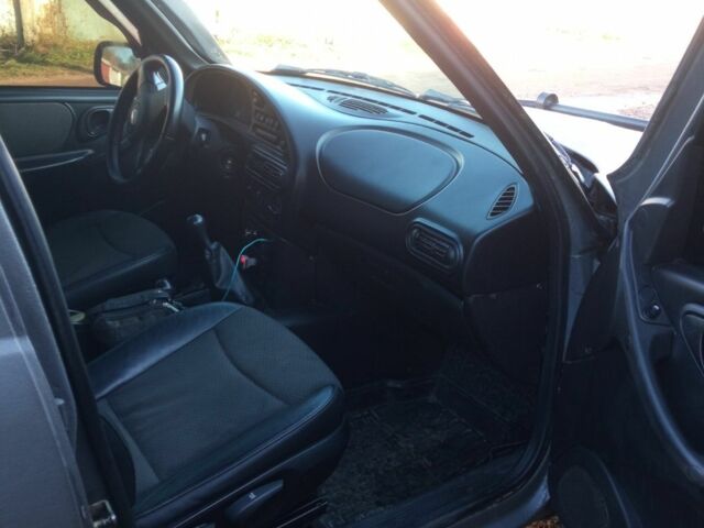 Серый Шевроле Нива, объемом двигателя 1.7 л и пробегом 170 тыс. км за 4100 $, фото 4 на Automoto.ua