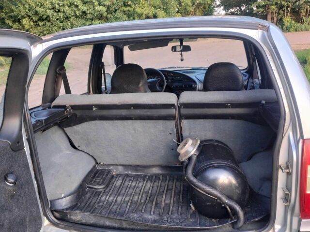 Серый Шевроле Нива, объемом двигателя 1.7 л и пробегом 169 тыс. км за 2700 $, фото 4 на Automoto.ua