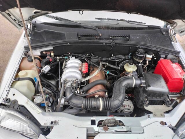 Серый Шевроле Нива, объемом двигателя 1.7 л и пробегом 169 тыс. км за 2700 $, фото 9 на Automoto.ua