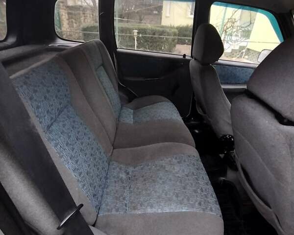 Серый Шевроле Нива, объемом двигателя 1.7 л и пробегом 147 тыс. км за 3200 $, фото 7 на Automoto.ua