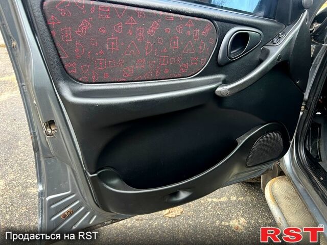 Серый Шевроле Нива, объемом двигателя 1.7 л и пробегом 195 тыс. км за 3300 $, фото 8 на Automoto.ua