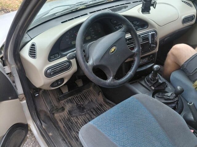 Сірий Шевроле Нива, об'ємом двигуна 1.7 л та пробігом 230 тис. км за 1666 $, фото 5 на Automoto.ua