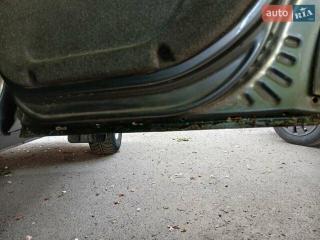Серый Шевроле Нива, объемом двигателя 1.69 л и пробегом 148 тыс. км за 3500 $, фото 9 на Automoto.ua