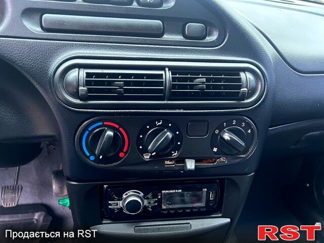 Серый Шевроле Нива, объемом двигателя 1.7 л и пробегом 195 тыс. км за 3300 $, фото 11 на Automoto.ua