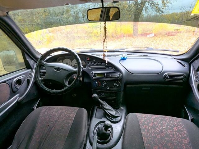 Сірий Шевроле Нива, об'ємом двигуна 1.7 л та пробігом 242 тис. км за 2400 $, фото 6 на Automoto.ua