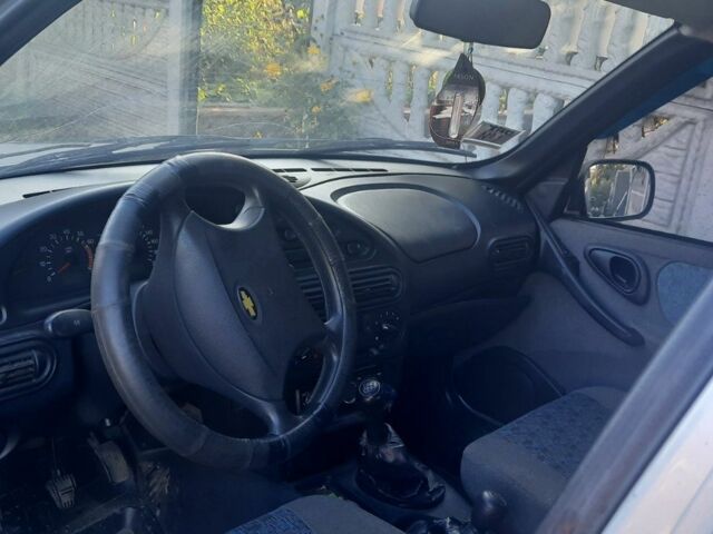 Серый Шевроле Нива, объемом двигателя 1.7 л и пробегом 137 тыс. км за 3600 $, фото 5 на Automoto.ua