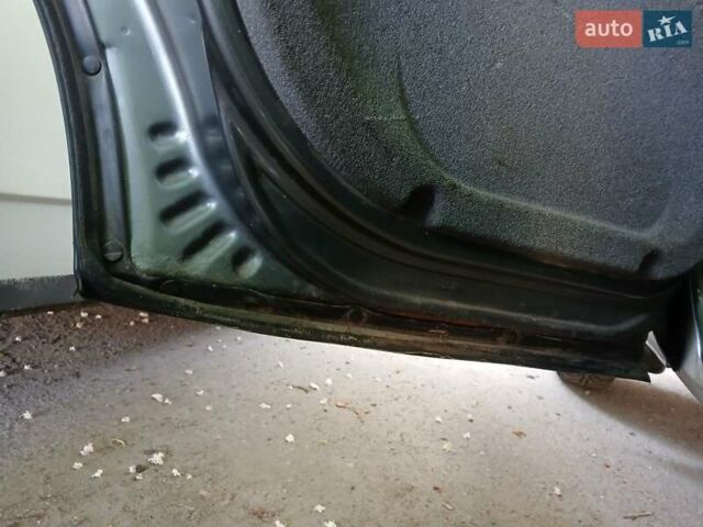 Серый Шевроле Нива, объемом двигателя 1.69 л и пробегом 148 тыс. км за 3500 $, фото 7 на Automoto.ua