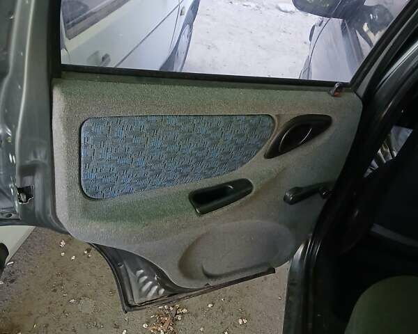 Серый Шевроле Нива, объемом двигателя 1.69 л и пробегом 148 тыс. км за 3500 $, фото 6 на Automoto.ua