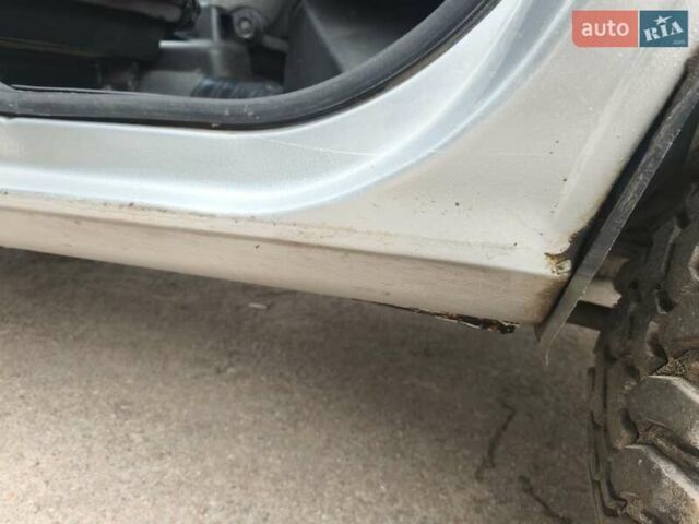 Серый Шевроле Нива, объемом двигателя 1.69 л и пробегом 140 тыс. км за 4000 $, фото 4 на Automoto.ua