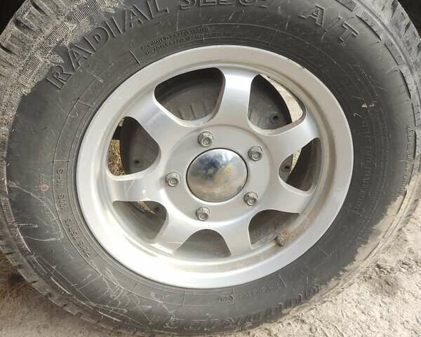 Серый Шевроле Нива, объемом двигателя 1.69 л и пробегом 226 тыс. км за 3700 $, фото 6 на Automoto.ua