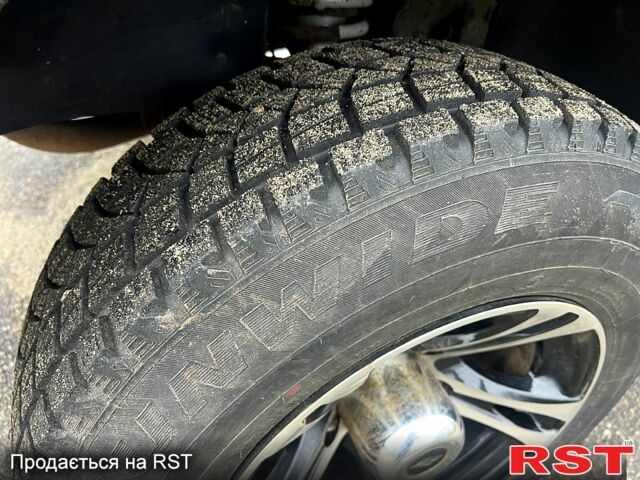 Серый Шевроле Нива, объемом двигателя 1.7 л и пробегом 195 тыс. км за 3300 $, фото 5 на Automoto.ua