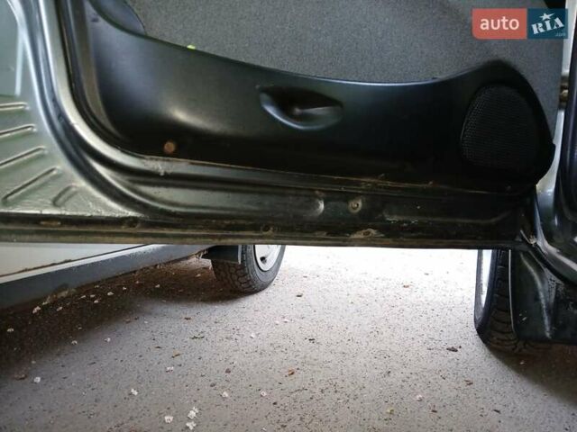 Серый Шевроле Нива, объемом двигателя 1.69 л и пробегом 148 тыс. км за 3500 $, фото 5 на Automoto.ua