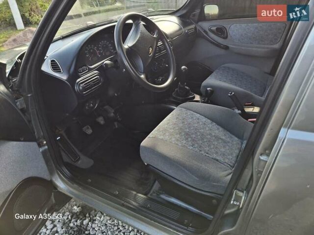 Серый Шевроле Нива, объемом двигателя 1.7 л и пробегом 161 тыс. км за 3000 $, фото 19 на Automoto.ua
