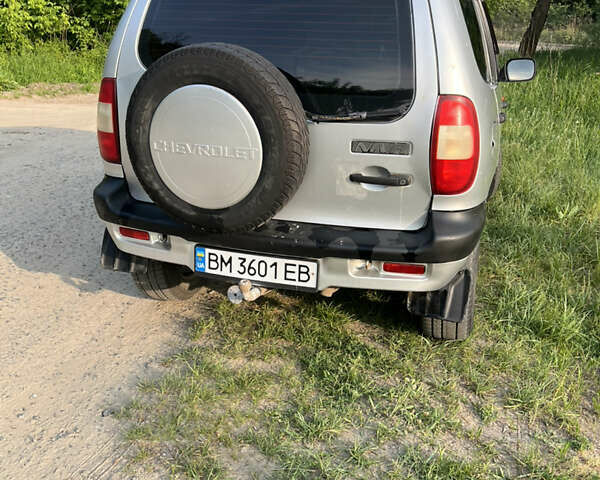 Серый Шевроле Нива, объемом двигателя 1.69 л и пробегом 244 тыс. км за 3500 $, фото 2 на Automoto.ua