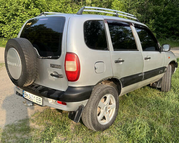 Серый Шевроле Нива, объемом двигателя 1.69 л и пробегом 244 тыс. км за 3500 $, фото 3 на Automoto.ua