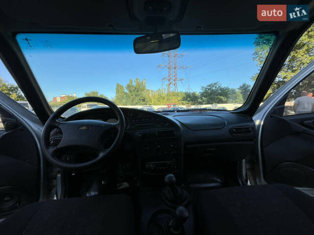 Серый Шевроле Нива, объемом двигателя 1.7 л и пробегом 232 тыс. км за 2700 $, фото 11 на Automoto.ua