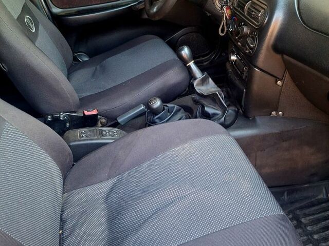 Серый Шевроле Нива, объемом двигателя 1.7 л и пробегом 200 тыс. км за 3300 $, фото 3 на Automoto.ua