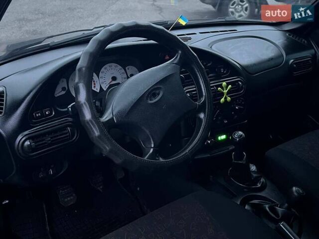 Сірий Шевроле Нива, об'ємом двигуна 1.7 л та пробігом 201 тис. км за 3999 $, фото 26 на Automoto.ua