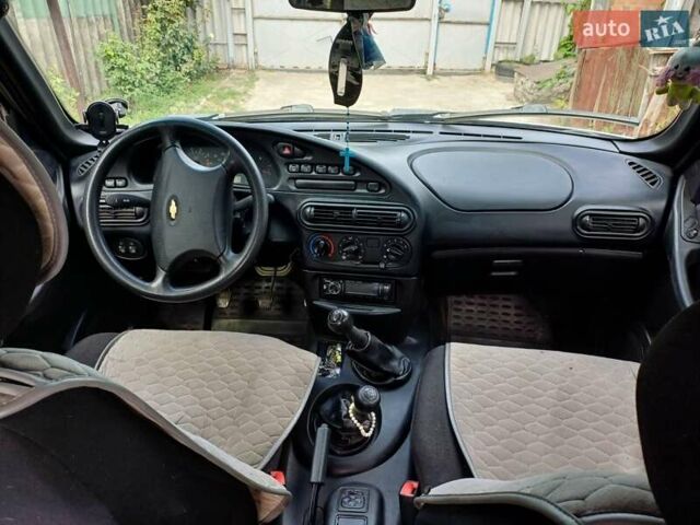 Серый Шевроле Нива, объемом двигателя 1.69 л и пробегом 85 тыс. км за 4100 $, фото 2 на Automoto.ua