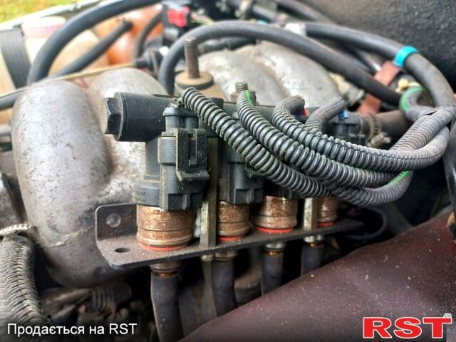 Сірий Шевроле Нива, об'ємом двигуна 1.7 л та пробігом 188 тис. км за 1950 $, фото 6 на Automoto.ua