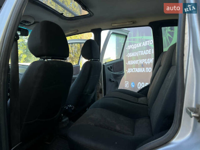 Серый Шевроле Нива, объемом двигателя 1.7 л и пробегом 232 тыс. км за 2700 $, фото 10 на Automoto.ua