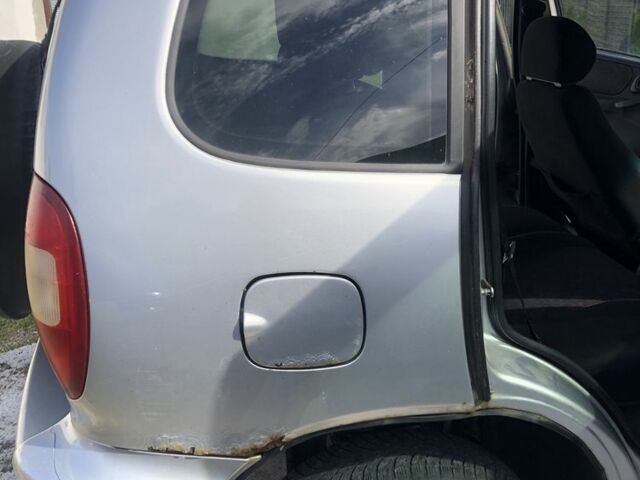 Серый Шевроле Нива, объемом двигателя 1.7 л и пробегом 3 тыс. км за 2500 $, фото 4 на Automoto.ua