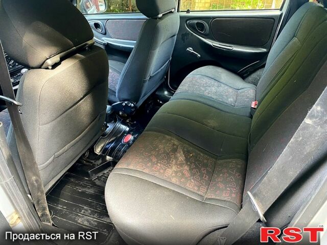 Серый Шевроле Нива, объемом двигателя 1.7 л и пробегом 200 тыс. км за 3350 $, фото 6 на Automoto.ua