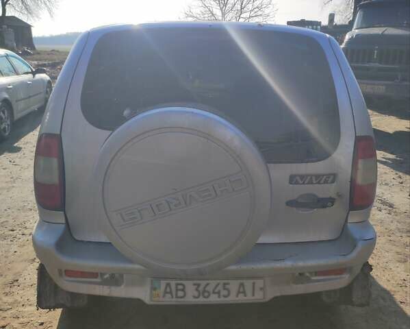 Серый Шевроле Нива, объемом двигателя 1.7 л и пробегом 100 тыс. км за 2500 $, фото 3 на Automoto.ua