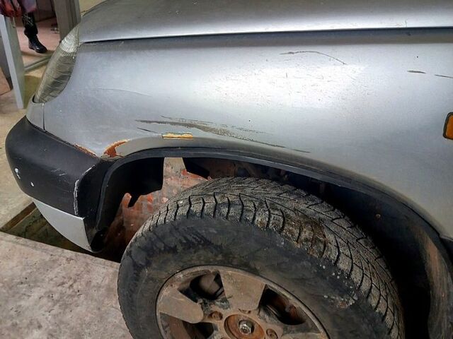 Серый Шевроле Нива, объемом двигателя 1.7 л и пробегом 230 тыс. км за 2600 $, фото 3 на Automoto.ua