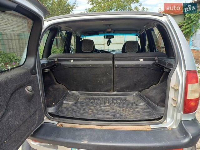 Серый Шевроле Нива, объемом двигателя 1.69 л и пробегом 85 тыс. км за 4100 $, фото 3 на Automoto.ua