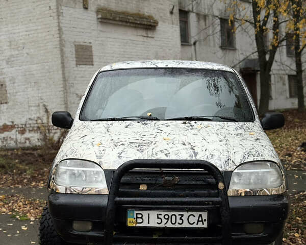 Сірий Шевроле Нива, об'ємом двигуна 1.7 л та пробігом 300 тис. км за 2999 $, фото 18 на Automoto.ua