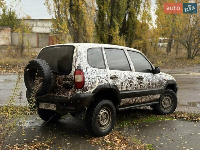 Сірий Шевроле Нива, об'ємом двигуна 1.7 л та пробігом 300 тис. км за 2999 $, фото 6 на Automoto.ua