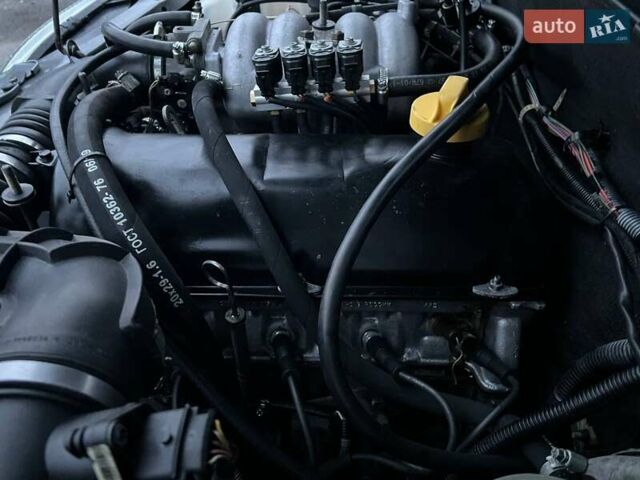 Сірий Шевроле Нива, об'ємом двигуна 1.7 л та пробігом 201 тис. км за 3999 $, фото 61 на Automoto.ua