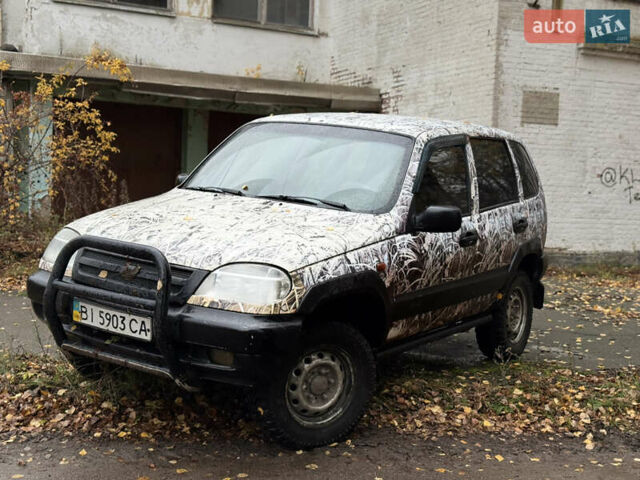 Сірий Шевроле Нива, об'ємом двигуна 1.7 л та пробігом 300 тис. км за 2999 $, фото 17 на Automoto.ua