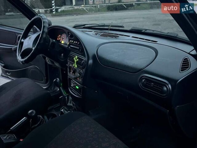 Сірий Шевроле Нива, об'ємом двигуна 1.7 л та пробігом 201 тис. км за 3999 $, фото 53 на Automoto.ua