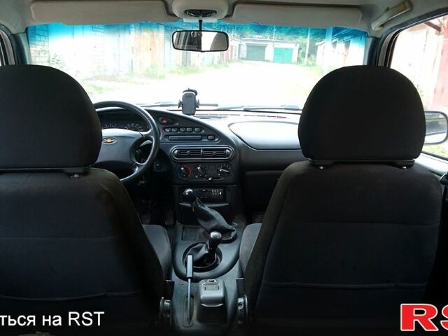 Серый Шевроле Нива, объемом двигателя 1.7 л и пробегом 233 тыс. км за 3600 $, фото 4 на Automoto.ua