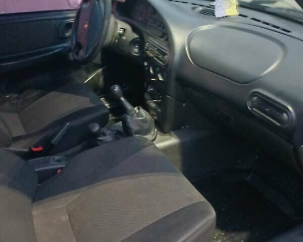 Серый Шевроле Нива, объемом двигателя 1.7 л и пробегом 213 тыс. км за 3500 $, фото 10 на Automoto.ua