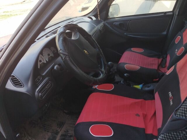 Серый Шевроле Нива, объемом двигателя 1.7 л и пробегом 1000 тыс. км за 2500 $, фото 1 на Automoto.ua