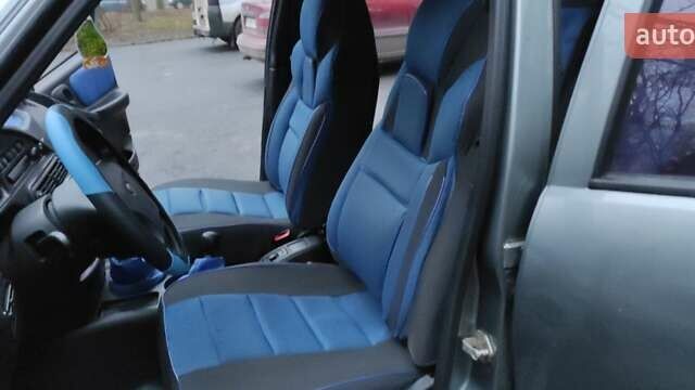 Серый Шевроле Нива, объемом двигателя 1.7 л и пробегом 83 тыс. км за 4500 $, фото 8 на Automoto.ua