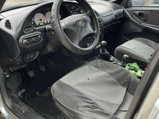 Серый Шевроле Нива, объемом двигателя 1.7 л и пробегом 111 тыс. км за 2999 $, фото 6 на Automoto.ua