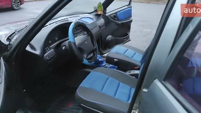 Серый Шевроле Нива, объемом двигателя 1.7 л и пробегом 83 тыс. км за 4500 $, фото 7 на Automoto.ua